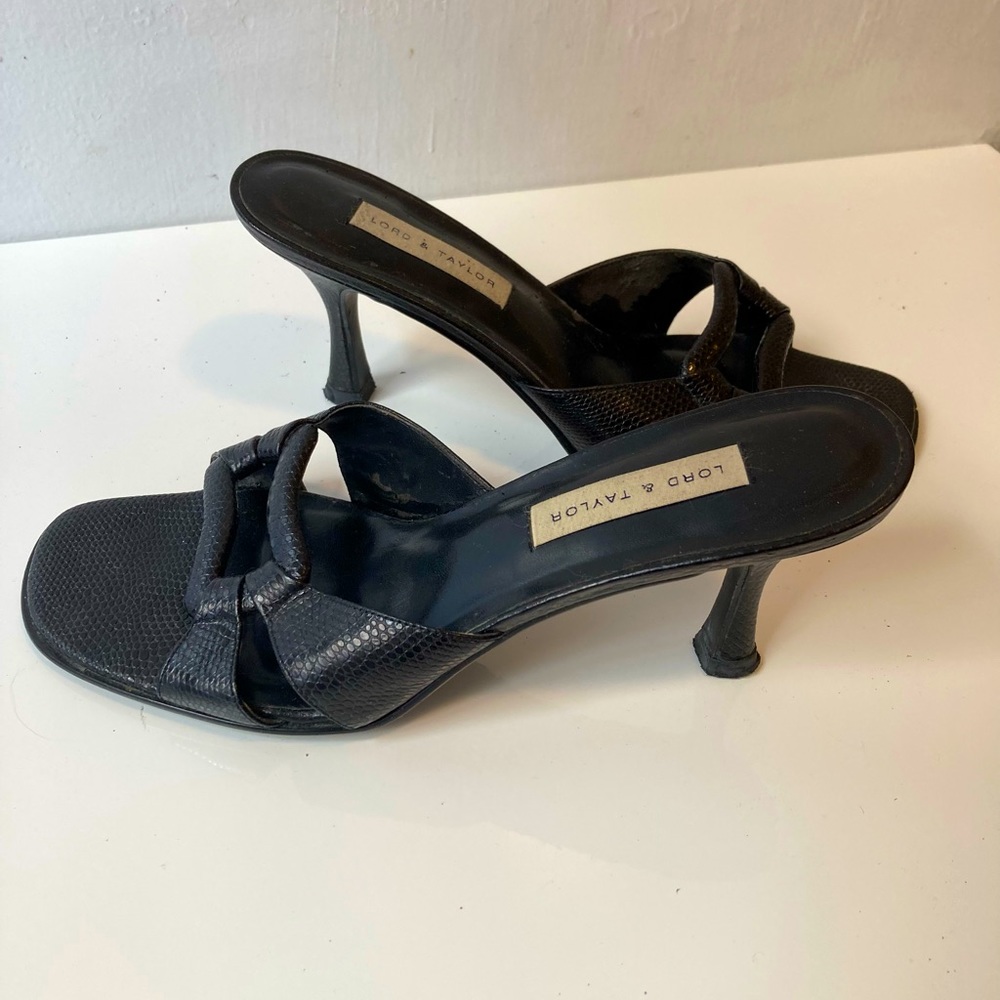 A gorgeous pair of black strappy black low heel sandals!